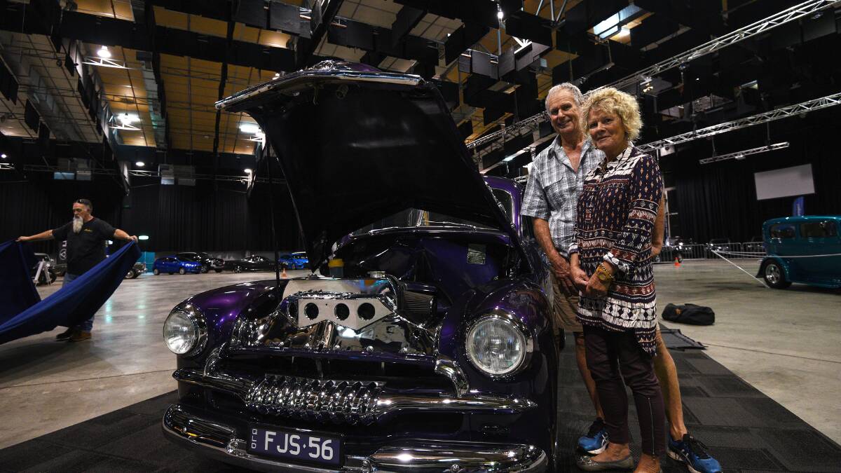 Classic motor: Paul and Allie Connolly from Evens Head with their modified 56 FJ Holden that they call The General. Photo: Gareth Gardner 190517
