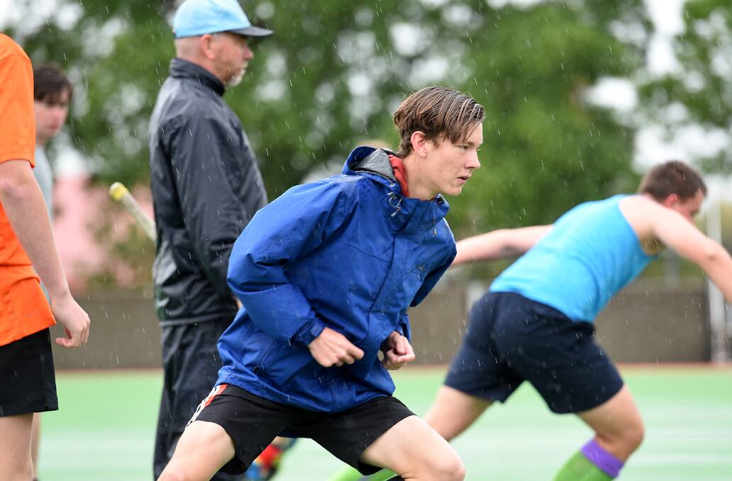 Jamie O'Connor looks focused as he completes a set of shuttle runs at the NIAS hockey trials. Photo: Gareth Gardner 221016GGA04