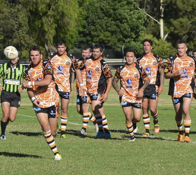 Top paddock: The Muswellbrook Rams in action against Aberdeen this year. The Group 21 club has been nominated amongst five others as the CRL Club of the Year.