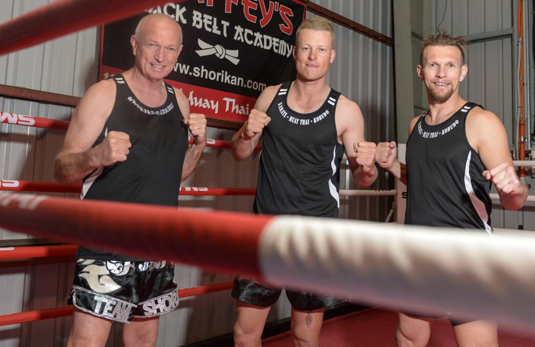 Next Generation: Clint Chaffey with his heavy hitting newly crowned Muay Thai champion Mitch Reeves and trainer Scott Chaffey back at training after the victory.