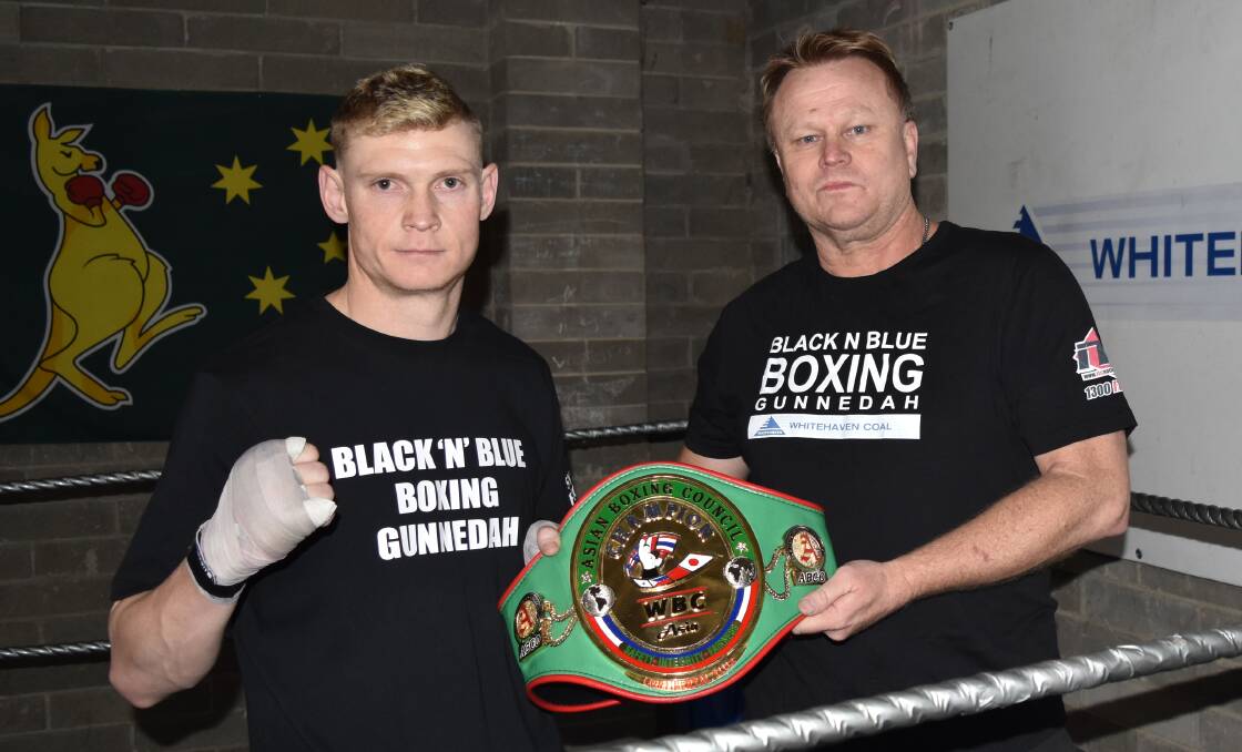 READY: Wade Ryan with trainer David Syphers at the Black ‘N’ Blue Boxing Gym in Gunnedah. Photo: Ben Jaffrey