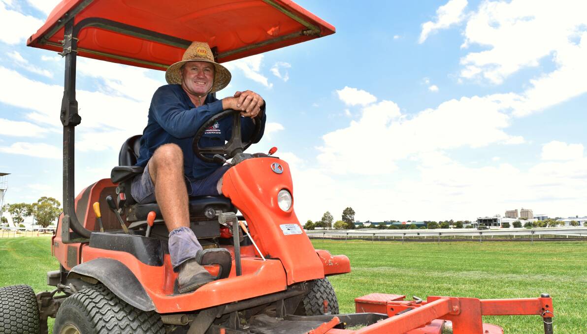 MAINTAINED: Lindsay Bowne gives the Tamworth Jockey Club track a mow on Thursday. Photo: Ben Jaffrey