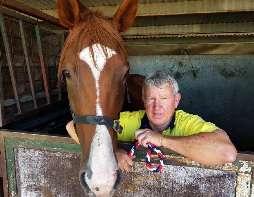 THANKS: Moree Race Club president Rob Mather with Real Blonde, a horse he part-owns. Photo: Bill Poulos