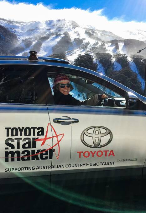 ON THE ROAD AGAIN: Star Maker winner Karin Page in her vehicle, supplied as part of the Star Maker talent quest prize she won in January.