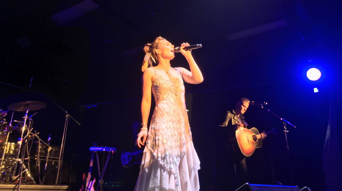 FROM SCREEN TO STAGE: Clare Bowen and her fiance Brandon Robert Young on stage in Blazes auditorium at West Tamworth Leagues Club on Tuesday night. 
