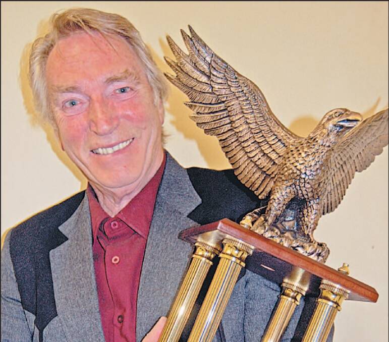 REMEMBER FRANK: Frank Ifield made his name in the 1950s and 60s and fundraising has started to honour him with a bronze bust. He is pictured with the Country Music Living Legend Award he received in 2008. PICTURE: LAURIE BULLOCK