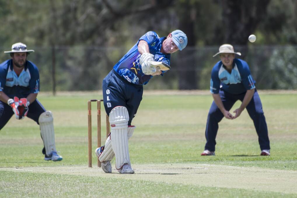 FOOT DOWN: Old Boys' Adam Lole hits out. Photo: Peter Hardin