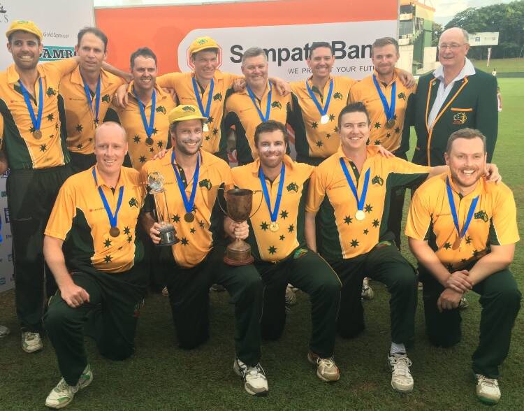 YOU BEAUTY: The Aussies celebrate their six-run win over Sri Lanka in the final. 