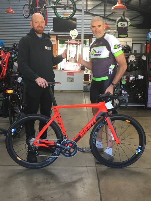 INSPIRING: Mark Jeffrey (right) with Ben Clark of BC Bike Shop, sponsor of Tamworth Cycle Club's John Dewhurst Memorial Handicap on Saturday.