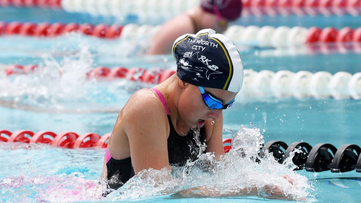 PRECISION: Clementine Monet of Tamworth City powers to victory on the 200m breaststroke. Photo:  Gareth Gardner.