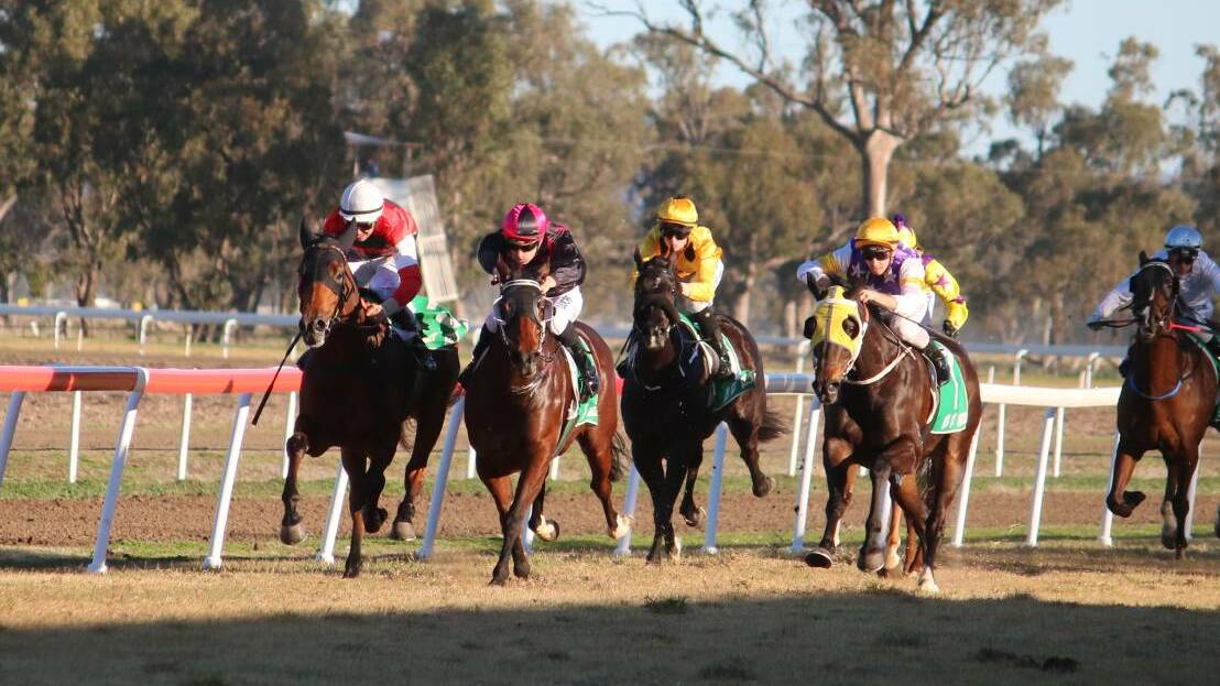 Josh Adams (pink and black) has backed up his win on Avroson in the Curlewis Cup at Gunnedah with a win in Grafton on Wednesday.