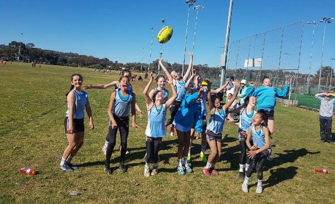 PARTY TIME: North West celebrate at the PSSA touch tournament.