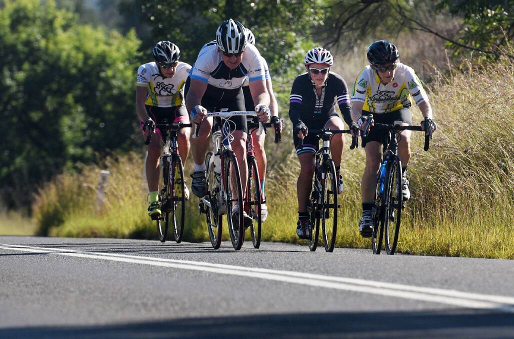 THE GRIND: Kylie Wright (second from right) en route to winning the 100 kilometre Nemingha to Nundle road race on Sunday. Photo: Gareth Gardner 210517GGA26