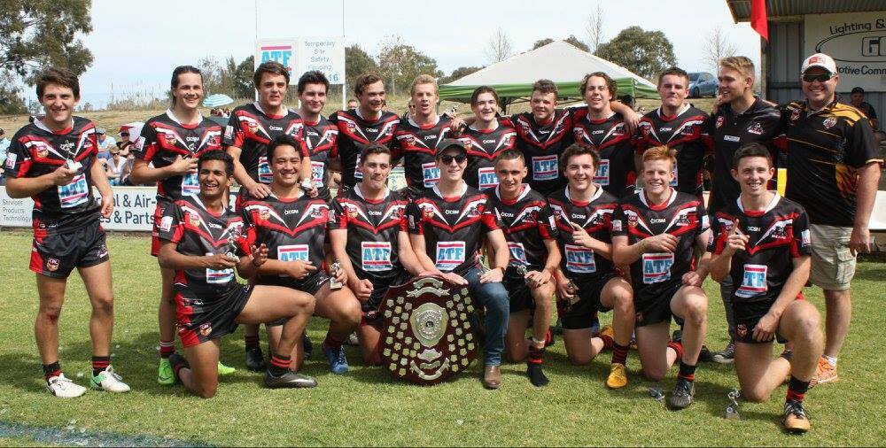 Altus and Hall, back row centre, celebrate North Tamworth's under-18 grand final win over Narrabri at Jack Woolaston Oval this year. Altus scored three tries in the match.