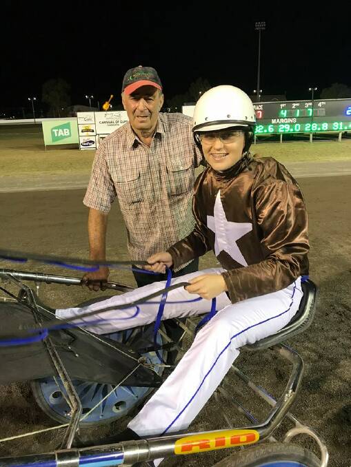 FAMILY ACT: Maddi Simon and her grandfather, Len Simon, after their success with Mammals Rockstar at Tamworth Paceway on Thursday: Photo: PeterMac Photography 