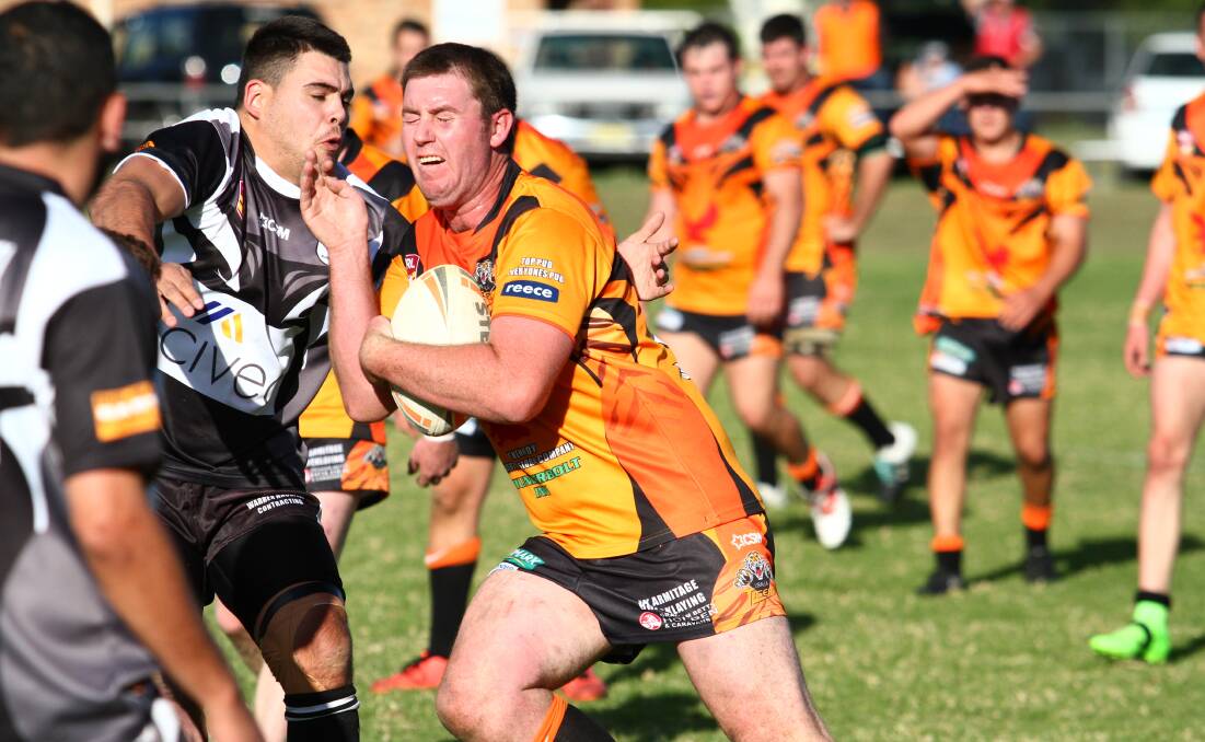 IMPACT ZONE: Tigers prop Grant Cooper helps out with the grunt work that set up a polished 24-14 win over the Magpies at Werris Creek on Saturday. 