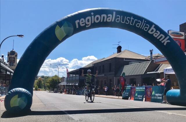 OH, WHAT A FEELING: Brent Rees of Inverell wins the A-grade race at the Autumn Festival Criterium in Armidale on Sunday. Photo: Contributed