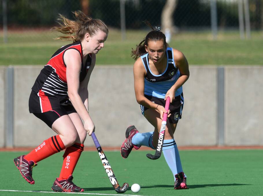 FOCUS: North West's Dakotah Barnett-Suey (right) in action in the side's 1-0 loss to Sydney North at the State CHS Girls Championships in Tamworth on Wednesday. Photo: Gareth Gardner 240517GGB05