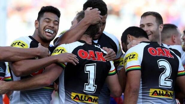 Houdini act: Panthers players celebrate a try en route to an improbable comeback. Photo: Getty Images
