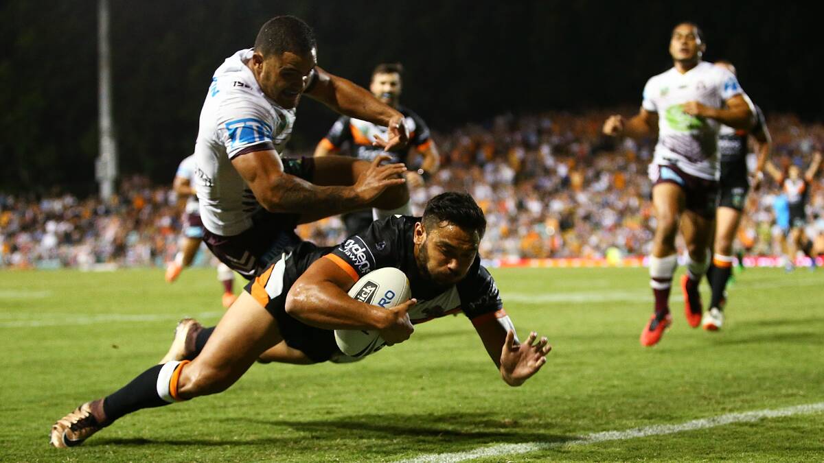 EXCITING: West Tigers star David Nofoaluma is set to return to Tamworth, with the club to play an historic premiership game at Scully Park in 2018. Photo: Getty Images