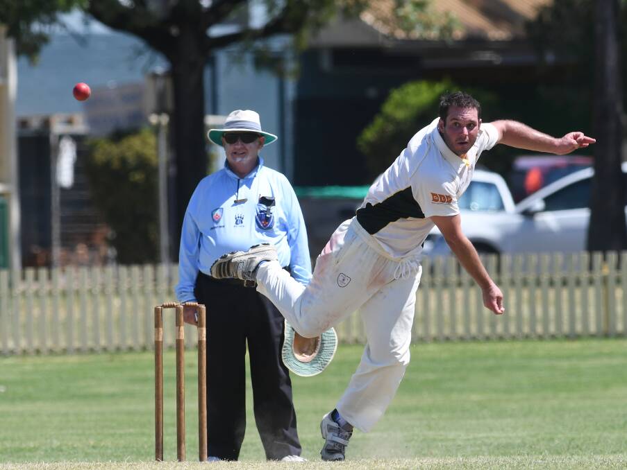 EXHAUSTING: Gunnedah allrounder Andy Mack bends the back as summer bites en route to figures of 1-40 from six overs. Photo: Gareth Gardner.