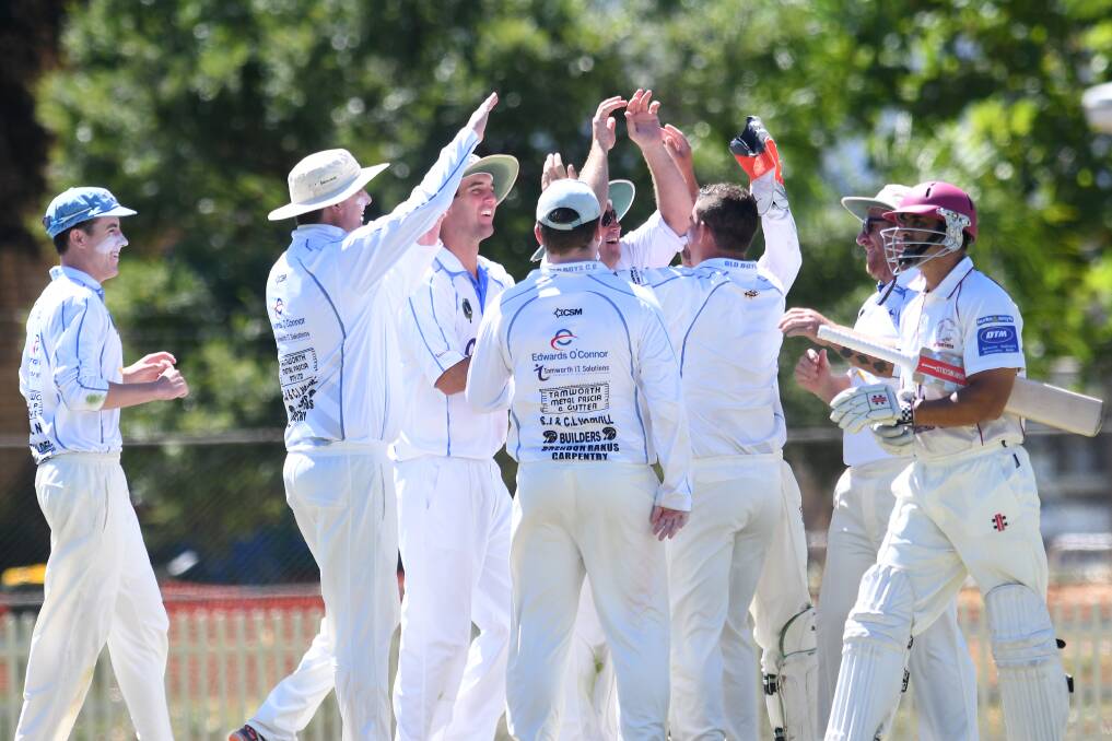 MONSTERED: The end is nigh. Old Boys celebrate the dismissal of Wests captain David Mudaliar, bowled for eight by Aaron Hazlewood. Photo: Gareth Gardner 