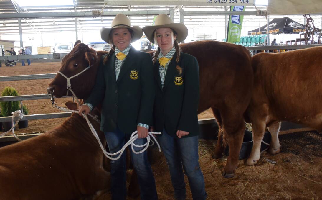 Peel High School students Rhiannon Johnson and Cathy Mitchell at the annual Beef Fest in Armidale on Tuesday.