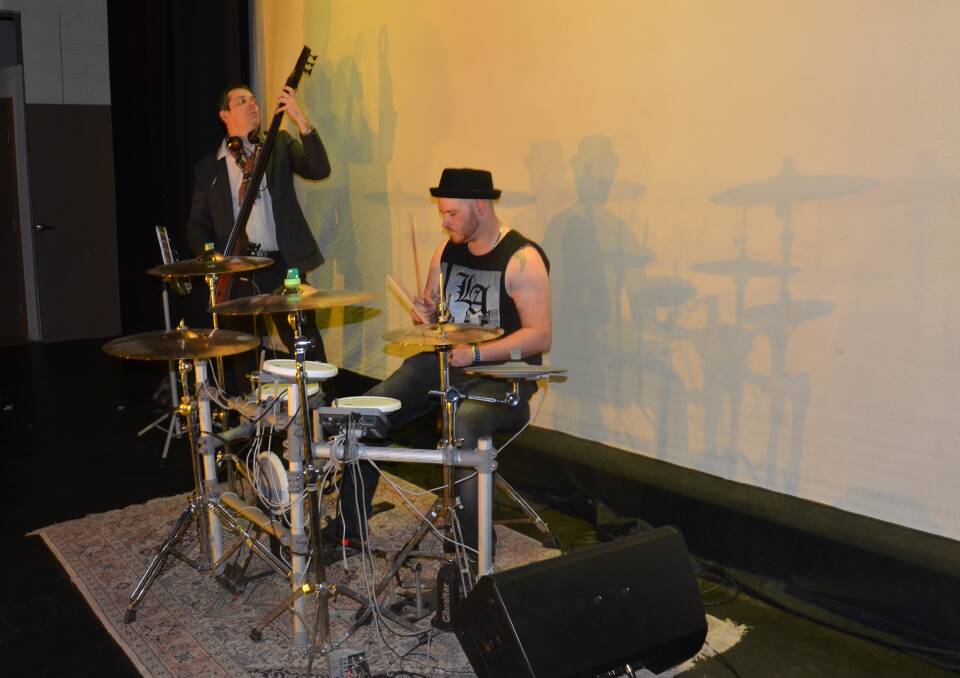 ROCK N' ROLL: The local Inverell band is tuning up, testing the sound and hitting the right notes as they practice at their rehearsal before the big concert.