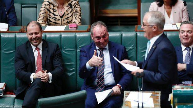 NEG UNVEILING: It's a thumbs up from Deputy Prime Minister Barnaby Joyce (centre) during Question Time at Parliament House in Canberra on Wednesday with Prime Minister Malcolm Turnbull (right) and Minister for Environment and Energy Josh Frydenberg (left). Photo: SMH.