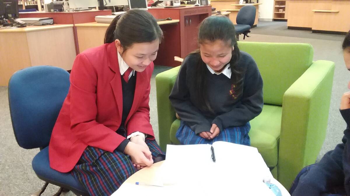 "Study Jam": Julia Lim helps Hser Ku Moo (Year 9 from Burma) with some tricky maths.