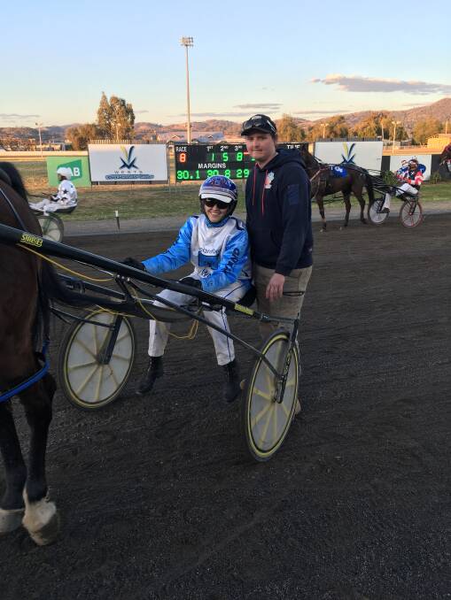 WINNER: Brendan Hunt with Ellen Rixon after she drove Merry Jasper to victory. Photo: PeterMac Photography.