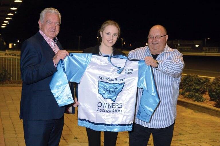 GREAT MOMENT: Elle Rixon being presented with her race colours as ambassador for the NSW SOA.
