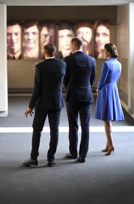 Sombre memorial: Prince William and his wife Kate, the Duchess of Cambridge, visit the museum of the Holocaust Memorial in Berlin, Germany.