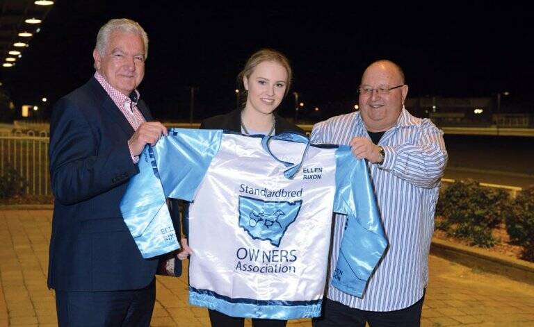 PROUD MOMENT: Ellen Rixon receives her silks from the NSW Standardbred Owners' Association.