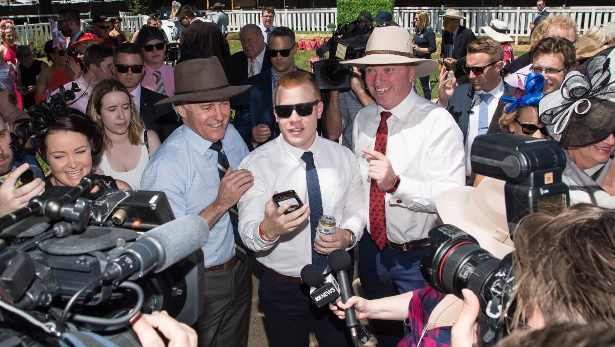 STAR: Tamworth's Mitch Salter, 21, snapchats Prime Minister Malcolm Turnbull, who was in town to support Barnaby Joyce in the New England by-election. Photo: Peter Hardin