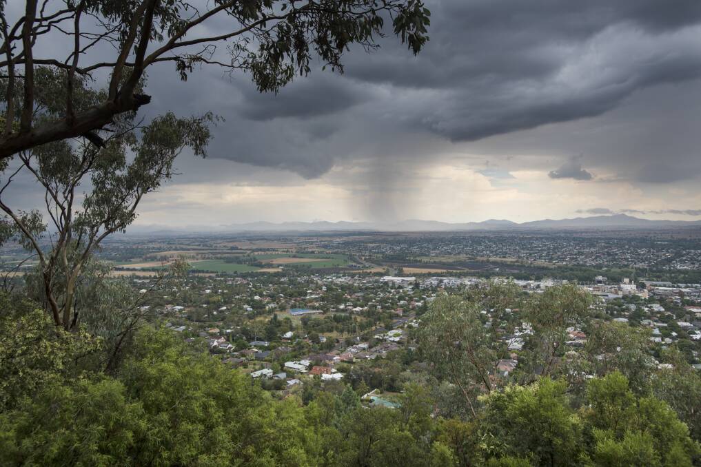 DOWNPOUR: Another deluge of rain hammered Tamworth on Thursday afternoon, as captured at Oxley Lookout. For more photos of this week's storms, visit The Leader website. Photo: Peter Hardin 081216PHC001