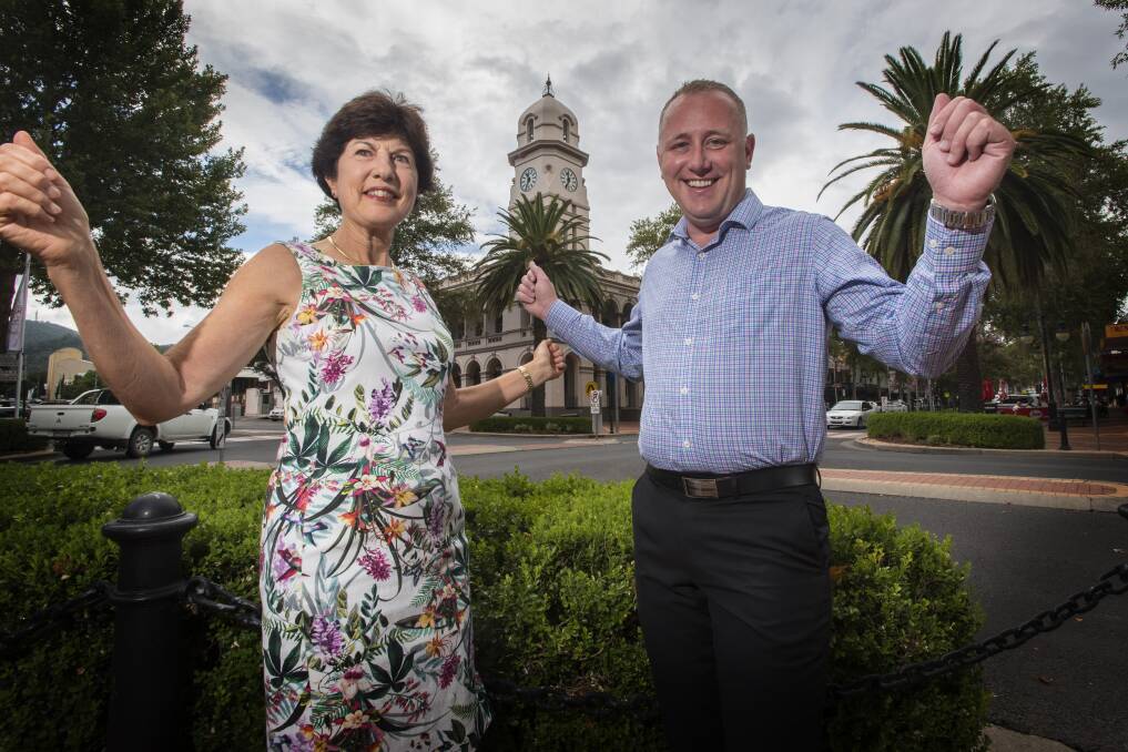 WINNING: Acting mayor Helen Tickle and Tamworth Business Chamber president Jye Segboer say the Queen's Baton Relay will put the city on the map. Photo: Peter Hardin