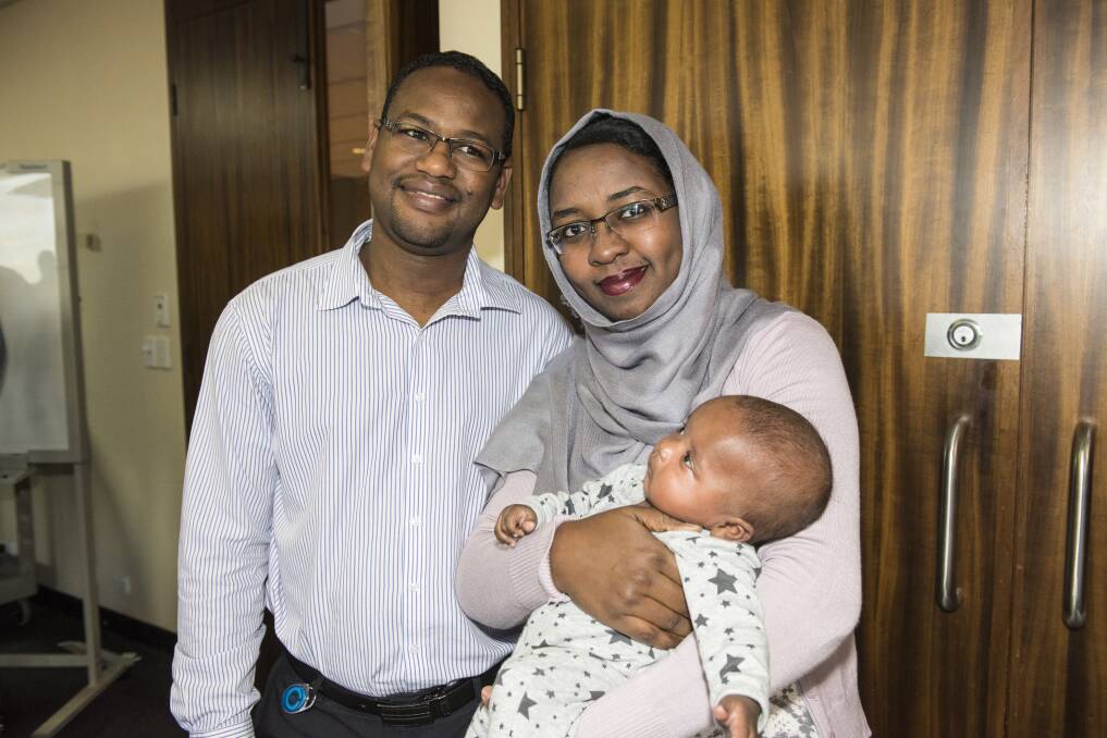 FAMILY: Yousif Yousif, Hana Ali and two-and-a-half-month-old Sami Yousif, came to Tamworth five months ago for work. They are among 16 new families to Tamworth. Photo: Peter Hardin