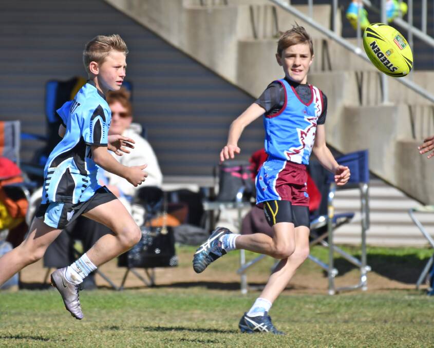 EYES ON THE PRIZE: Armidale City's Jacob Whitehill follows the ball against MacKillop during the NSW PSSA Boys Touch Carnival. Photo: Barry Smith 260716BSE06