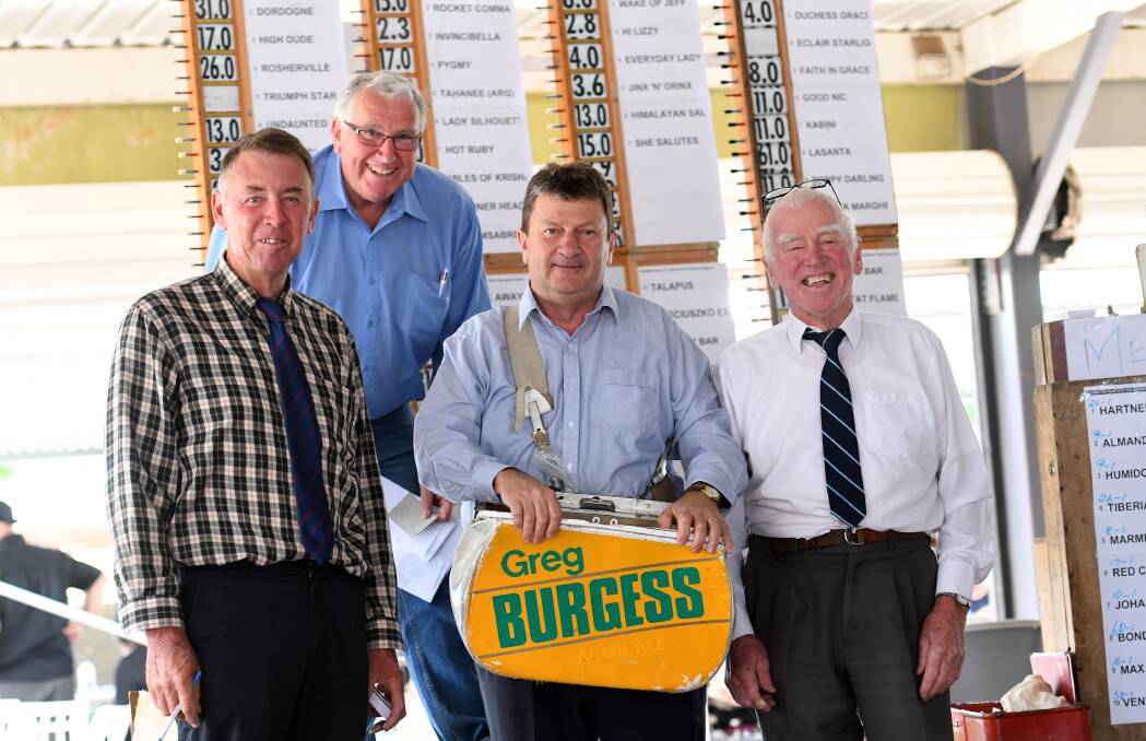 BOOKIES: (Back) Barry Luxford with (front L-R) Greg Burgess, Neville Yates and Garry Burgess. Photo: Gareth Gardner 