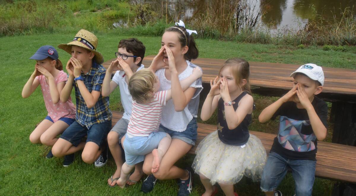 COO-EE: Kids practise ahead of the coo-ee competition at Bendemeer's Australia Day celebrations, before Nemingha's Toby Spykstra (far right) took out the bragging rights. Photo: Ella Smith