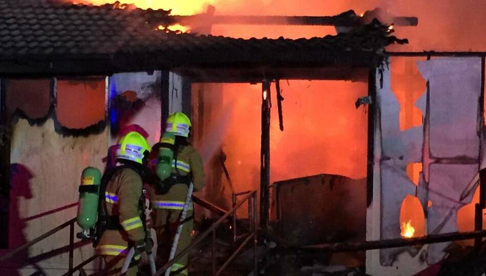 FIRST RESPONSE: Tamworth fire crews respond to a suspected deliberately-lit house fire on Warral Road last weekend. Photo: Fire and Rescue 452