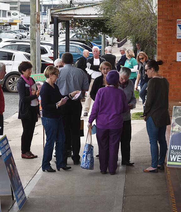 EVERY VOTE COUNTS: Ratepayers converge on Peel Street's returning office for pre-poll voting in Tamworth Regional Council's upcoming election on September 10. Photo: Gareth Gardner 290816GGC03