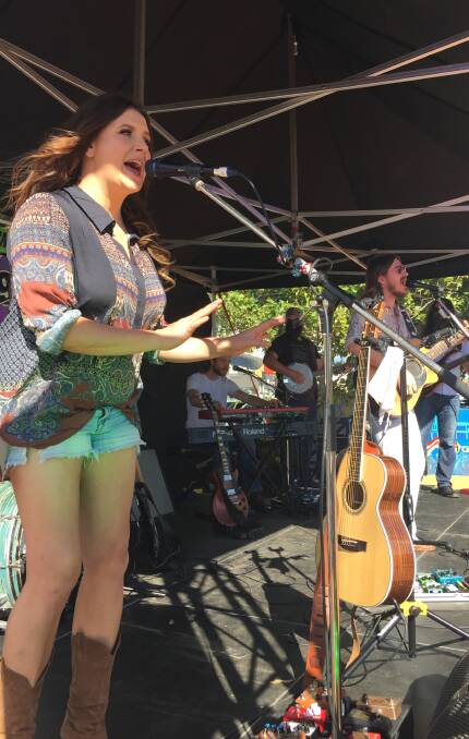 COUPLE OF CLASS ACTS: Brooke McClymont performs with husband Adam Eckersley at Sunday Sessions in the Park on Sunday afternoon. Photo: Ella Smith