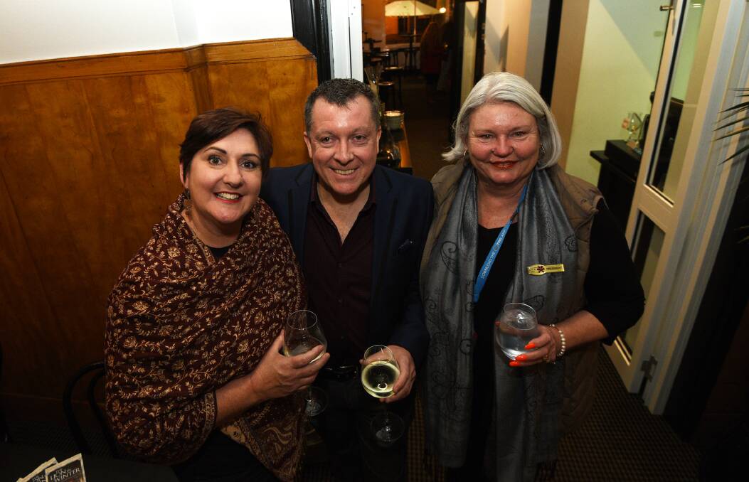 ACTION: Jennifer Ingall, Peter Ross and Ann Walsh celebrate Tamworth Dramatic Society's 70th birthday and the launch of its new production, 'Rumors', at CH on Peel on Monday night.  Photo: Gareth Gardner