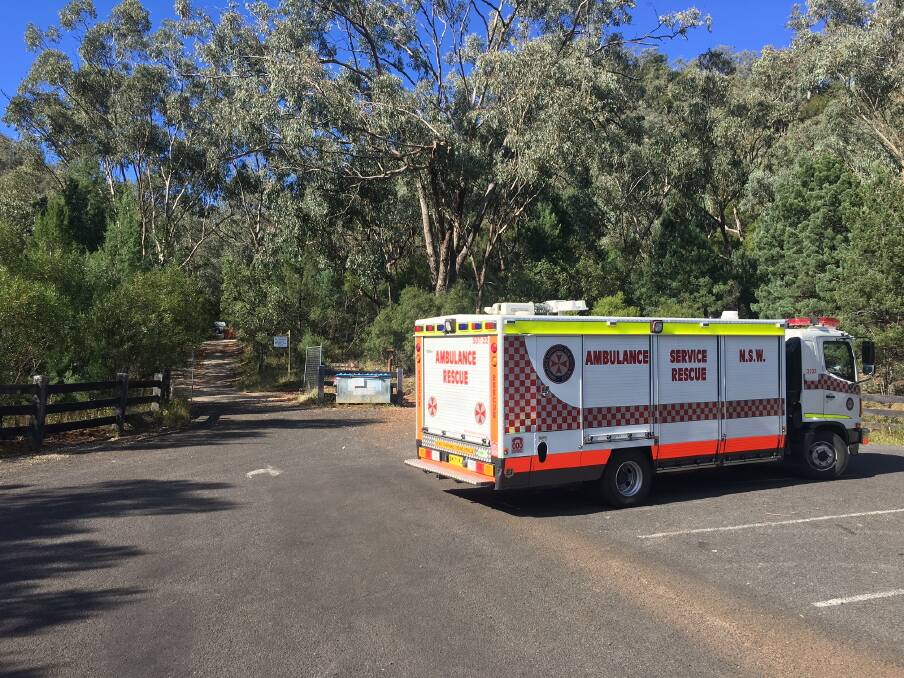 Ambulance crews respond to reports a man sustained injured ankle on Flagstaff. Photo: Breanna Chillingworth