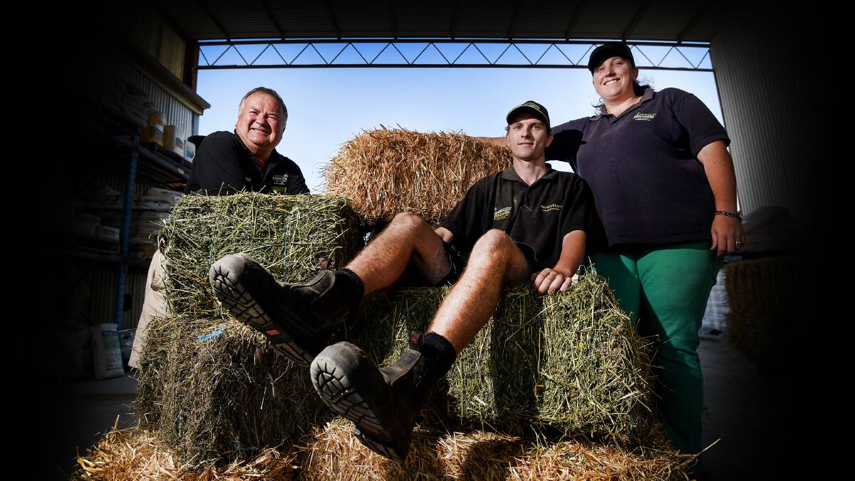 HELPING HAND: Rod Hazell, Scotty Welsh and Kellie Mackney are spearheading a hay drive to donate to producers hit by the Sir Ivan fire. Photo: Gareth Gardner 
