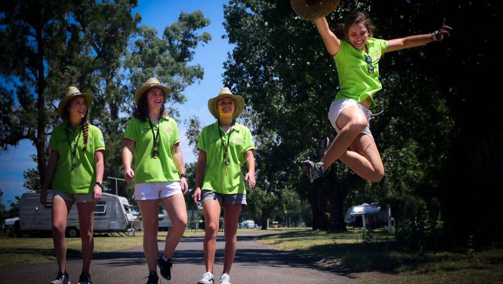JUMP FOR JOY: Nashville students Hailey Lund, 18, Kate Sullivan, 18, Olivia Tirrill, 17, and Evie Witty, 18, visit the Tamworth Country Music Festival in January. Photo: Simon McCarthy