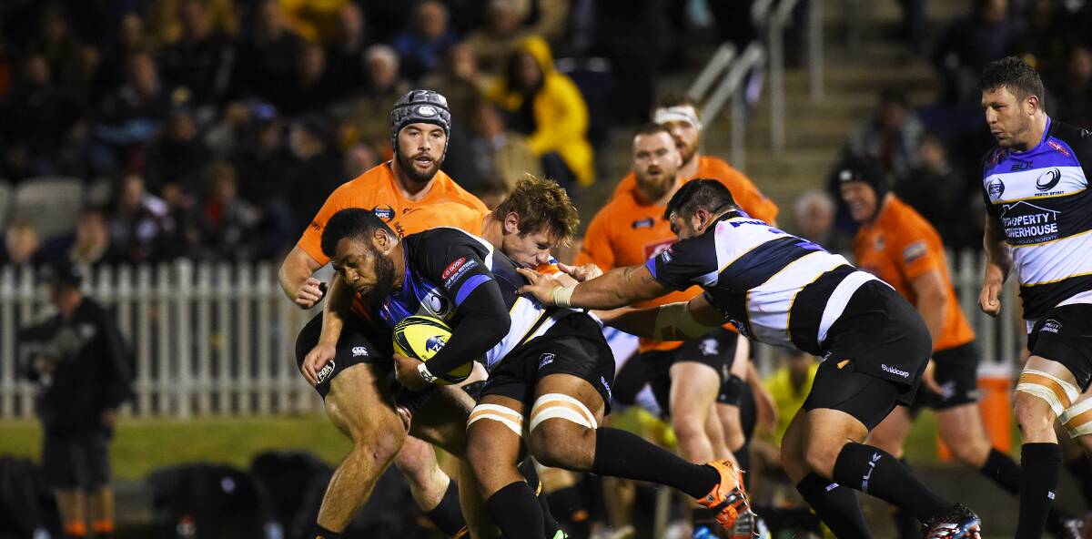 SHOW TIME: Perth Spirit breaks through Country Eagle's defence in the nationally-televised NRC decider at Scully Park on Saturday. Photo: Gareth Gardner 231016GGA11