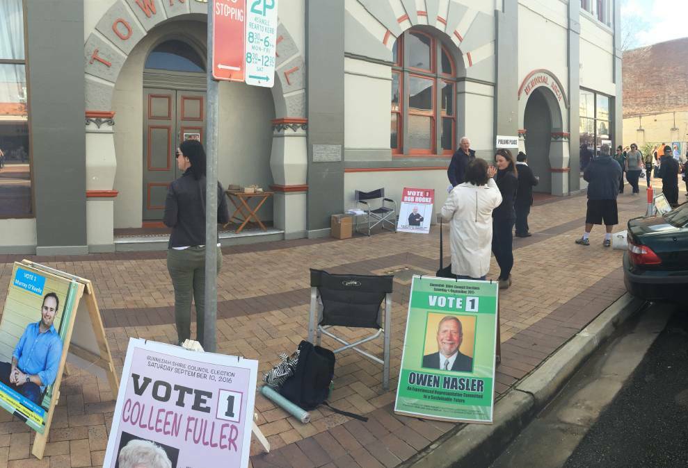 VOTING UNDER WAY: Campaigners and voters were out in force Saturday morning for the Gunnedah Shire Council election. Photo: Sam Woods